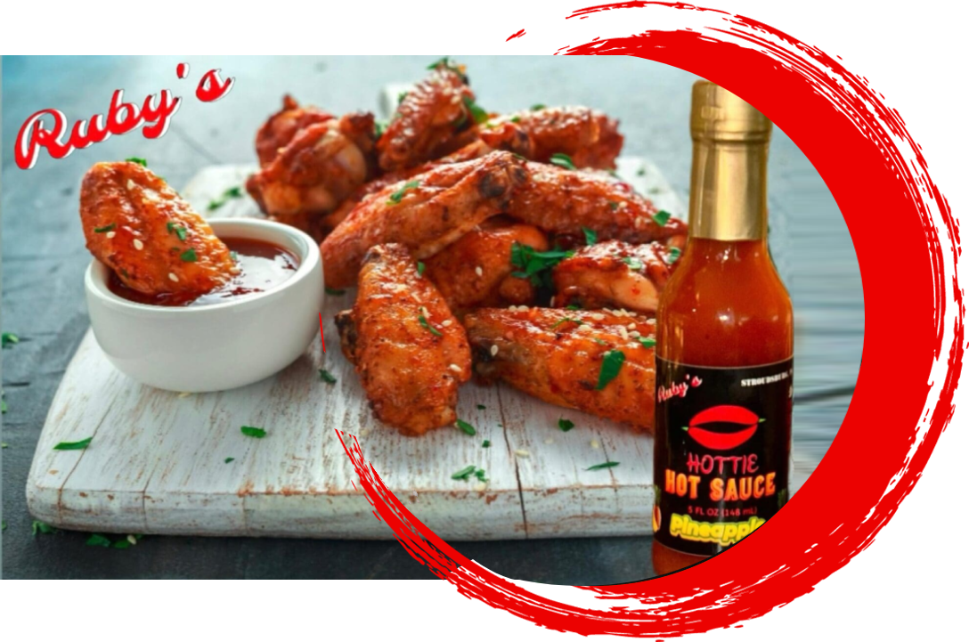 A bottle of hot sauce and some chicken wings.