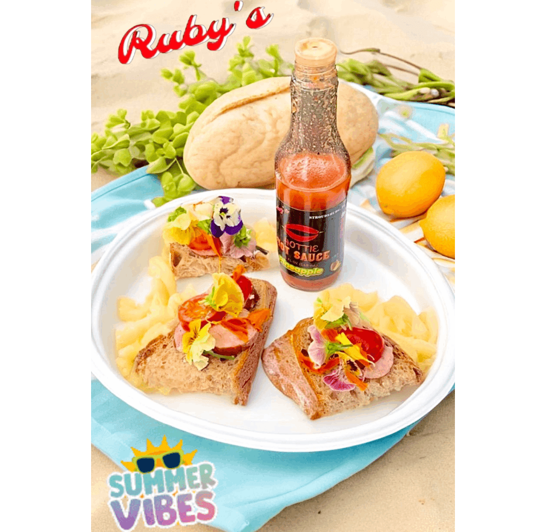 A plate of food with some bread and a bottle of soda.